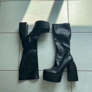 Beautiful black platform heel boots. Naked Wolfe inspired size 8!